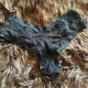 Victoria’s Secret black lace cheeky panty. Size small.
